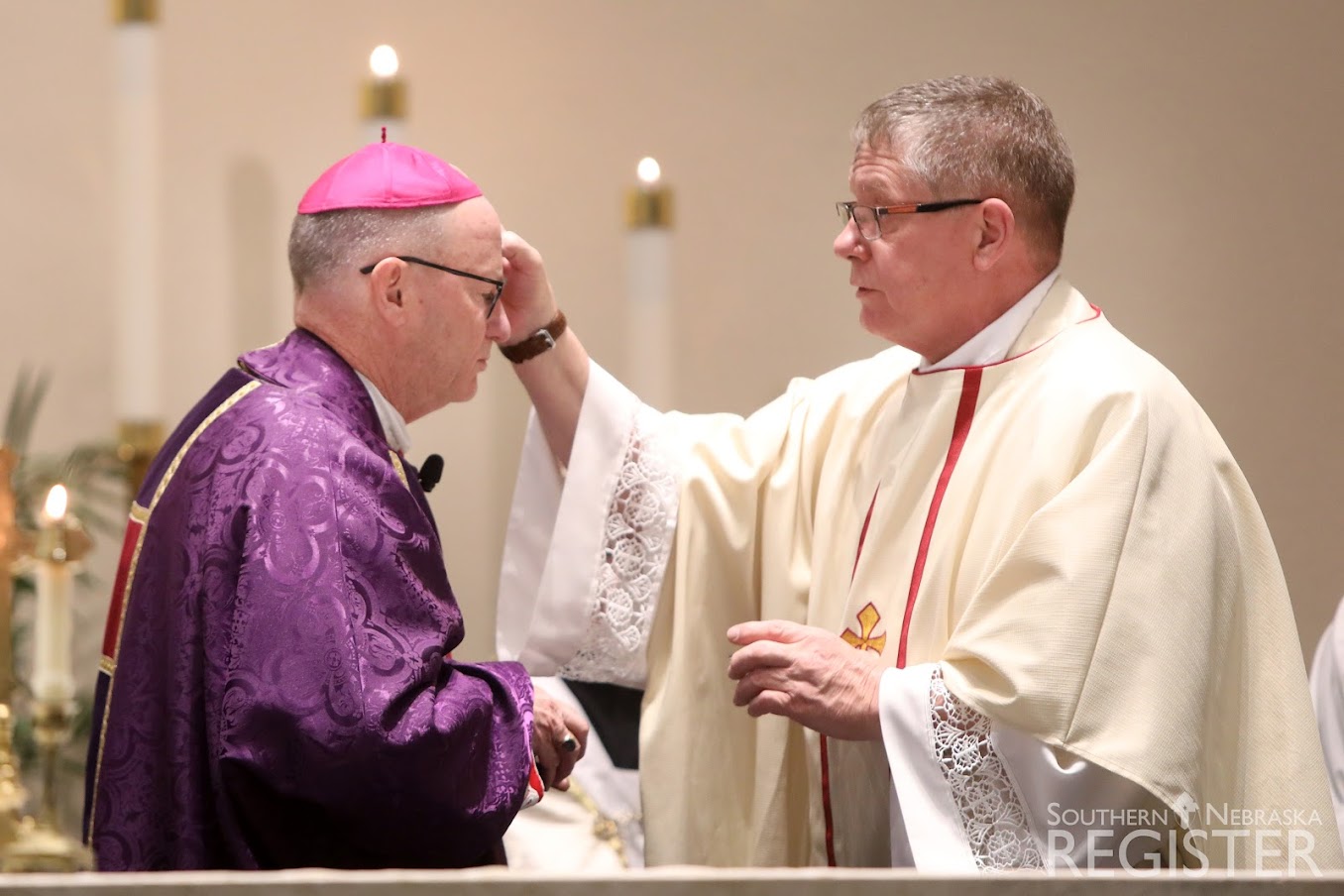 Fr Walsh giving ashes to bishop